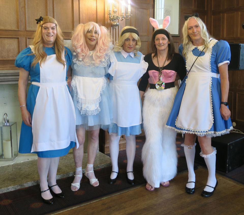 Four Alice's and a white rabbit